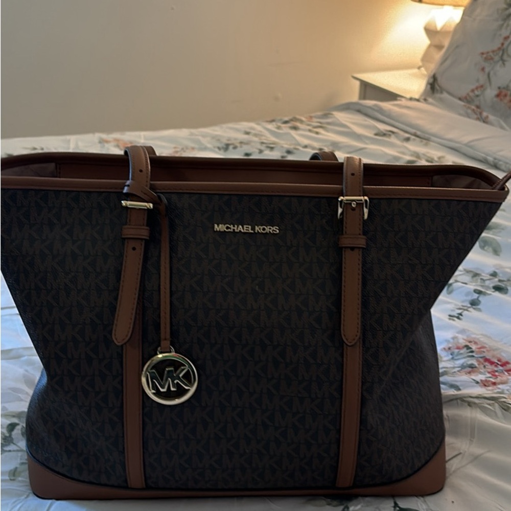 It is too big for me and wanted to go down to a smaller purse.